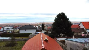 Expose Einfamilienhaus mit Seeblick mit großem Potenzial.