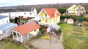 Expose Einfamilienhaus mit Seeblick mit großem Potenzial.
