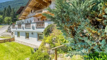 Expose Tradition trifft Panorama – Einfamilienhaus in Blockbauweise mit Blick ins Inntal