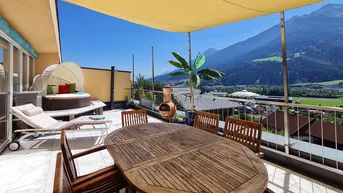 Expose Exklusive Maisonette-Wohnung mit Dachterrasse und malerischem Bergblick