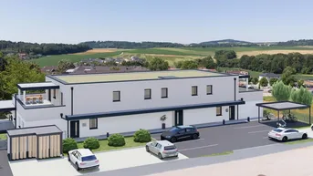 Moderne Wohnanlage mit Flachdach, Parkplätzen und weitem Blick ins Grüne.