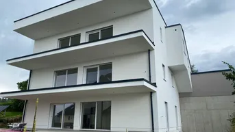 Expose Wohlfühlen am Sonnenhang - Erstbezug in moderne Gartenwohnung! (optional auch mit drei Zimmer für mehr Komfort)