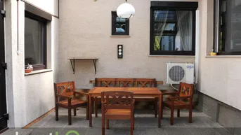Expose U-förmiges Haus mit überdachter Terrasse