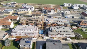 Expose Sattledt | Hauptstraße - Neubau mit Tiefgarage, Lift, Dachterrasse und PV-Anlage - werthaltige Ziegelmassivbauweise - jetzt informieren!