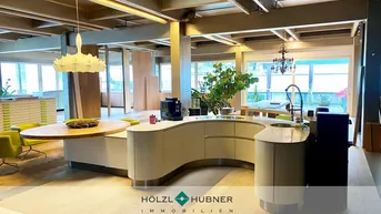 Expose Showroom mit Terrasse und hoher Raumhöhe