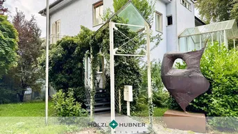 Expose Repräsentative Bürofläche mit besonderer Architektur im Grünen