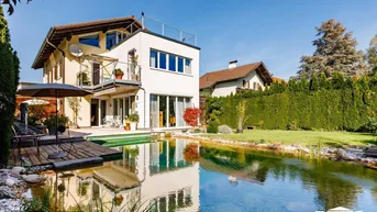 Expose Wohntraum-Idylle zum Verlieben: Top-ausgestattetes Wohnhaus mit Terrasse, Garten und Natur-Badeteich
