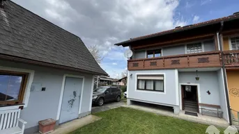 Expose Doppelhaushälfte unterkellert mit ebenem Gartengrundstück, Nebengebäude und Garage