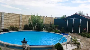 Expose STILVOLLES ZIEGELMASSIVHAUS IN GRÜNRUHELAGE MIT POOL IN TRUMAU