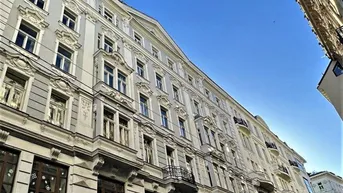 Expose SPIEGELGASSE, GRABEN-NÄHE, 95 m2 Altbau mit Balkon, 2 Zimmer, Komplettküche, Wannenbad, Parketten, 4. Liftstock, Flügeltüren