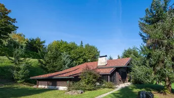 Expose Idyllisches Holzhaus mit großzügigem Grundstück