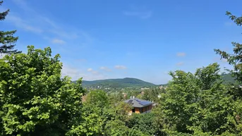 Expose Sonniges Baugrundstück für ca. 220 m² Einfamilienhaus mit Grünblick und Fernsicht, Top Anbindung an öffentliche Verkehrsmittel