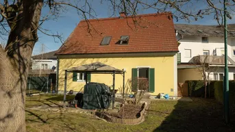 Expose Eigentumswohnung mit Garten, Terrasse und Parkplatz - EG