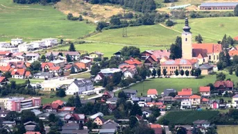 Expose Aufgeschlossenes, 1.069m² Baugrundstück in zentraler Lage
