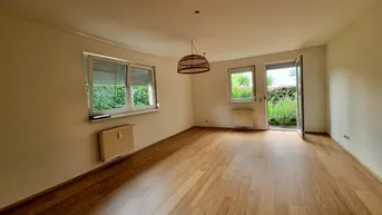 Expose Charmante 3-Zimmer-Wohnung mit eigenem Garten, Terrasse &amp; Tiefgaragenplatz