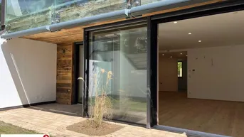 Expose Eleganz im Grünen – Hochwertige Gartenwohnung mit Ost-West-Ausrichtung 