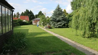 Expose Baugrundstück mit Abbruchsobjekt in ruhiger Lage