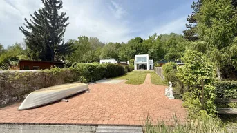 Expose NEUWERTIGES Haus am Pöttschinger See - Direkter Seezugang - BJ 2022 - ca. 574m² Pachtgrund - ca. 198m² NFL - 4 Zimmer - 2 Bäder - Balkon und Terrasse - neuwertige Einbauküche - große Doppelgarage