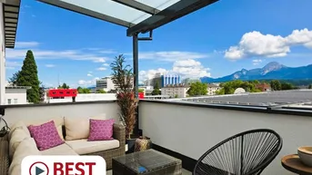 Expose Leben ON TOP mit Stadt- und Bergpanorama