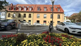 Expose EINFACH GENIAL! TOLLES ZINSHAUSPAKET! NEU ERRICHTETES WOHN- und GESCHÄFTSHAUS DIREKT AM HAUPTPLATZ!
