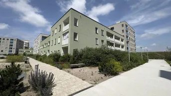 Expose com22PLUS - Attraktiv geförderte Mietwohnung mit DECKENKÜHLUNG und Loggia mit Blick ins Grüne