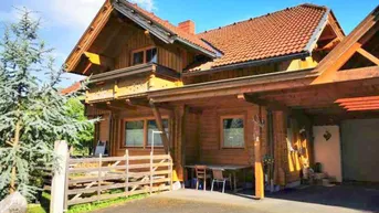 Expose Wohnhaus in Sachsenburg in massiver Holzbauweise mit Garage und Carport