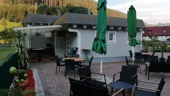 Expose Langfristig vermietetes Café mit Garage!
