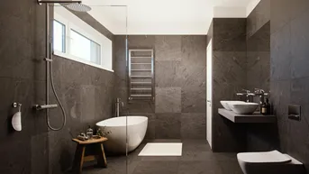 Modernes Badezimmer mit dunklen Fliesen, freistehender Badewanne und großer Dusche.