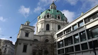 Expose Singel-Wohnung mit Schlafnische und Gemeinschaftsdachterrasse direkt beim Karlsplatz!