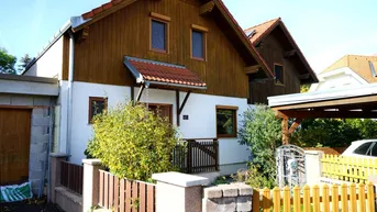 Expose Heimeliges Doppelhaus in Holzbauweise – Wohnen mit Wohlfühlfaktor in ruhiger Siedlungslage!
