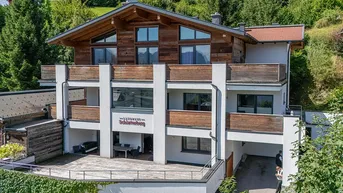 Expose Naturnah &amp; zentral: Stilvolle 4-Zimmer Erdgeschosswohnung mit großer Terrasse in Ski amadé-Nähe