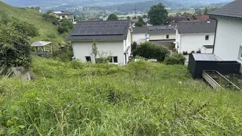 Expose Grundstück in Hanglage