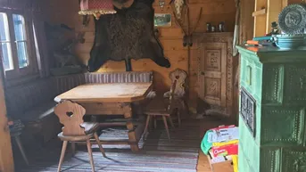 Expose Schörfling am Attersee: Holzblockhaus-Ferienhaus auf Baugrundstück in erhabener Lage über dem Attersee!