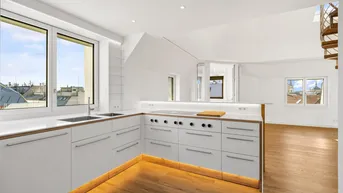 Expose Exklusiv und außergewöhnlich: Dachgeschoss-Wohnung mit Turm-Loggia