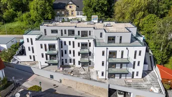 Expose Moderner Erstbezug: Sonnige 4-Zimmer-Wohnung mit Terrasse und Garten