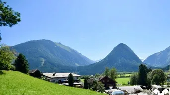 Expose Sonniges Baugrundstück mit Bergpanorama