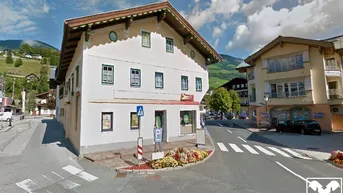 Expose Mehrparteienhaus mit Geschäftsfläche