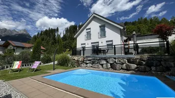 Expose Wohnhaus mit Bergblick