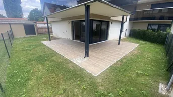 Expose ERSTBEZUG - neue 2 Zimmer Gartenwohnung mit 2 Garagenplätzen