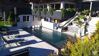 Expose DREAM BIG! Außergewöhnliches Einfamilienhaus mit Pool in Saalfelden