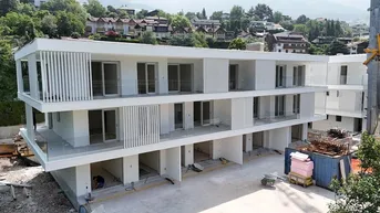 Expose B1 Brixen – The White Residence: Exklusives Monolokal mit cleverer Raumaufteilung, großzügigen Fensterflächen und privatem Garten in energieeffizienter Bauweise.
