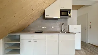Expose Kompakt &amp; modern – Dachgeschosswohnung ideal für Singles