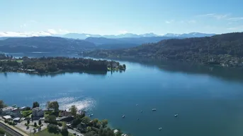 Expose EXKLUSIVES WOHNERLEBNIS am WÖRTHERSEE | NEUBAU mit GARTEN UND SEEBLICK in TOP LAGE