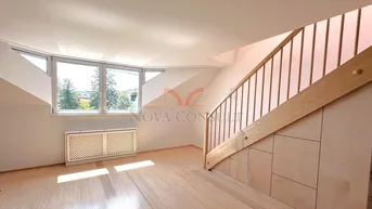 Expose Moderne Dachgeschossmaisonette mit Ausblick
