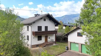Expose Ruhiges Wohnen im Grünen – Einfamilienhaus mit Garten und Doppelgarage