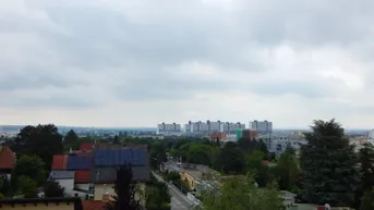 Expose "Provisionsfrei" Traumhafte Dachterrassenwohnung mit Fernsicht in Top-Lage - Erstbezug mit Tiefgarage