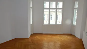 Expose Elegante 4-5 Zimmer-Altbauwohnung mit Flügeltüren und kleinen Balkon in zentraler Lage