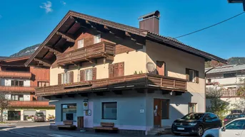 Expose Wohn- und Geschäftshaus in zentraler Lage