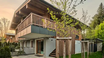 Expose Neubau-Chalethälften in sonniger Toplage