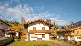 Expose Charmantes Grundstück in sonniger Aussichtslage von Jochberg